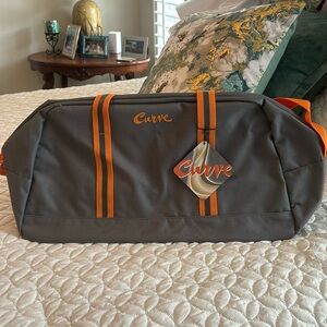 Curve Duffel Bag with handles and Adjustable Shoulder strap NWT